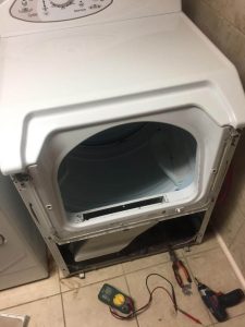 Repairing a broken washer in Toronto.
