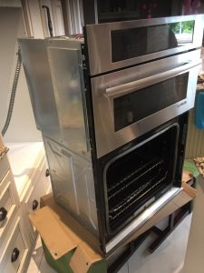 Our professionals providing oven repair services in Toronto.