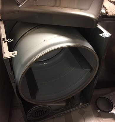 white tunnel inside of a washing machine